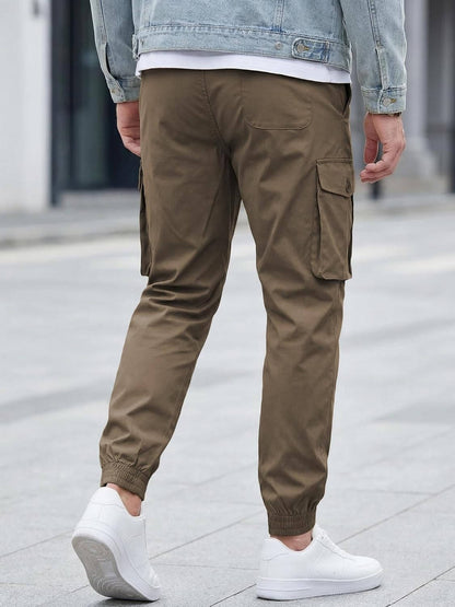 Homixa Belvora men's cargo joggers with drawstring waist, flap pockets, and tapered cuffs, casual and comfortable men's pants.