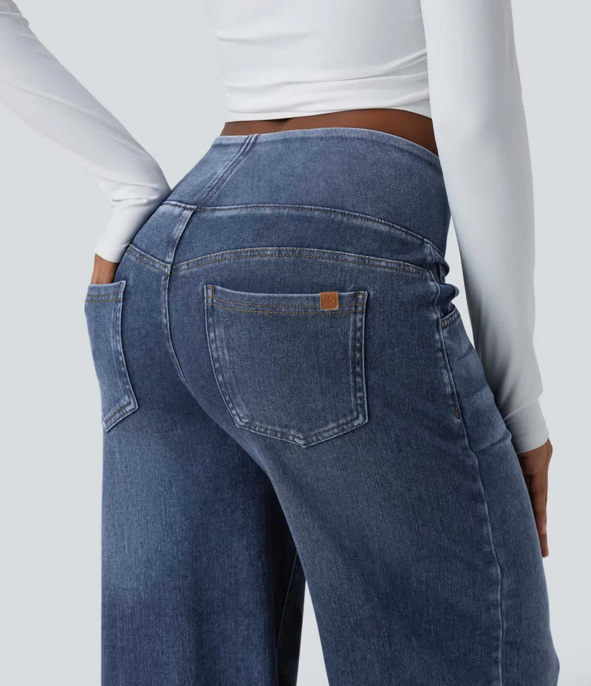 Mercer & Bloom Velouré Flex™ mid-rise washed casual baggy wide-leg jeans with draped design and front pockets.