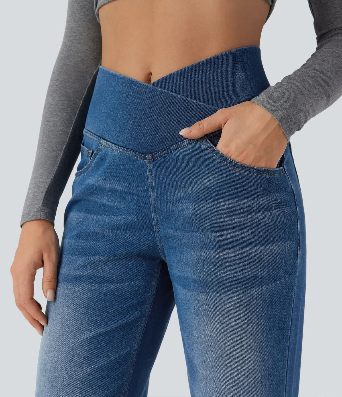 Mercer & Bloom UltraStretch™ crossover high-waisted jeans with tummy control, casual straight-leg fit and front pockets.