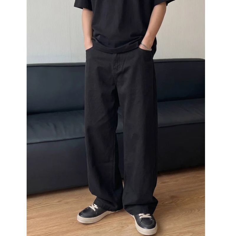 Men's loose-fit wide-leg jeans by Homixa with neutral wash, front and back pockets, casual denim style.