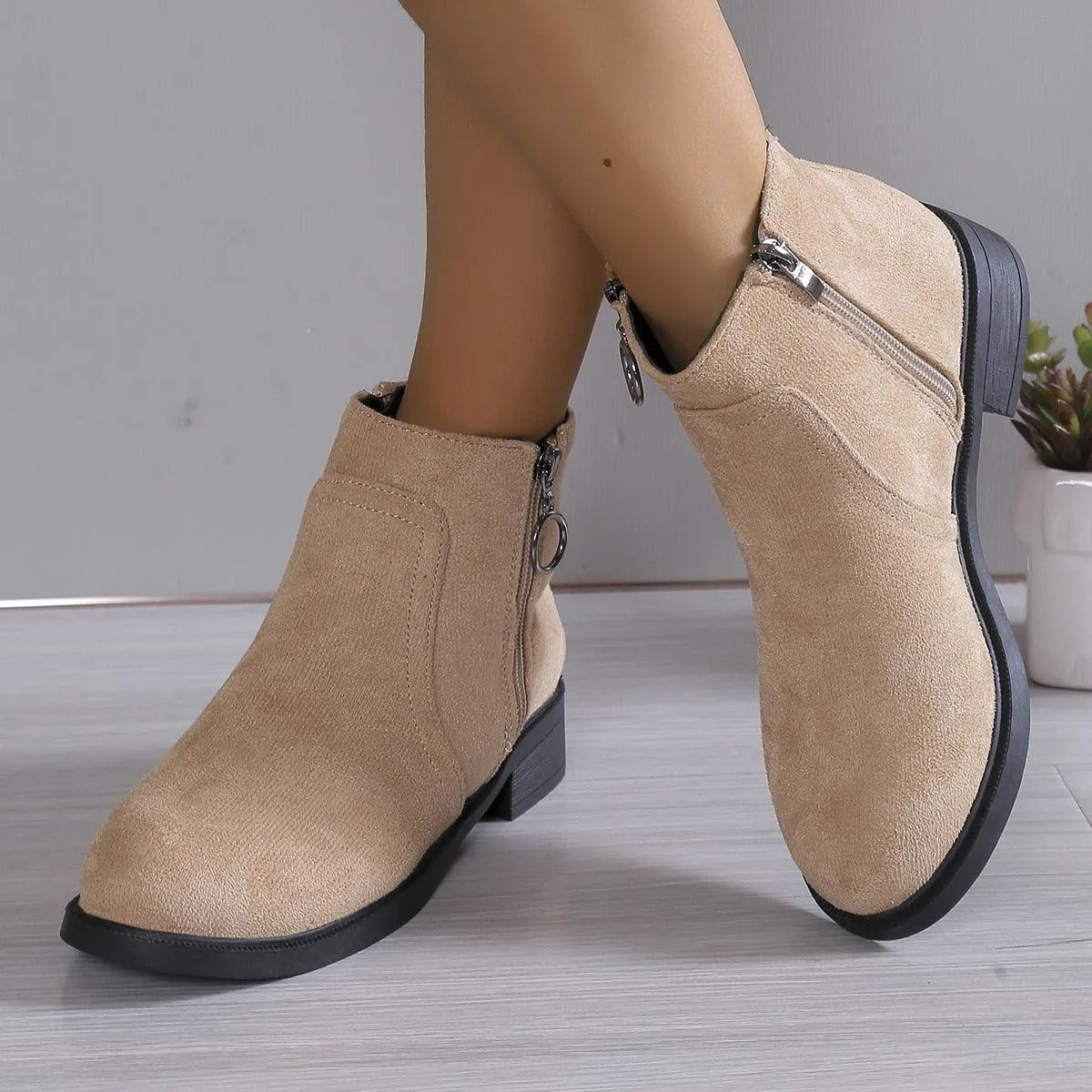 Homixa women's ankle boots with chunky-knit style, featuring a close-up of the textured knit fabric and sturdy sole.