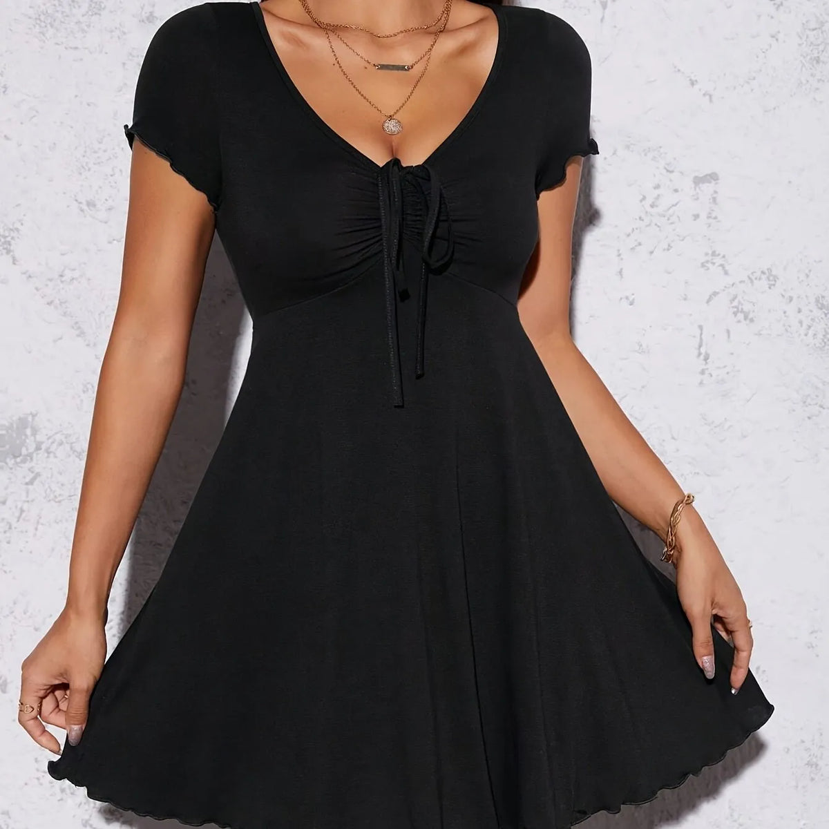 Women's solid color knit V-neck dress by Homixa, featuring an elegant and comfortable fit, perfect for stylish occasions.