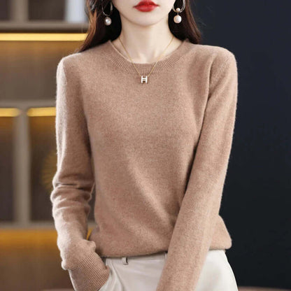 Homixa Belvia women's fine-knit crew-neck sweater with ribbed cuffs and solid color finish, shown in a close-up view.