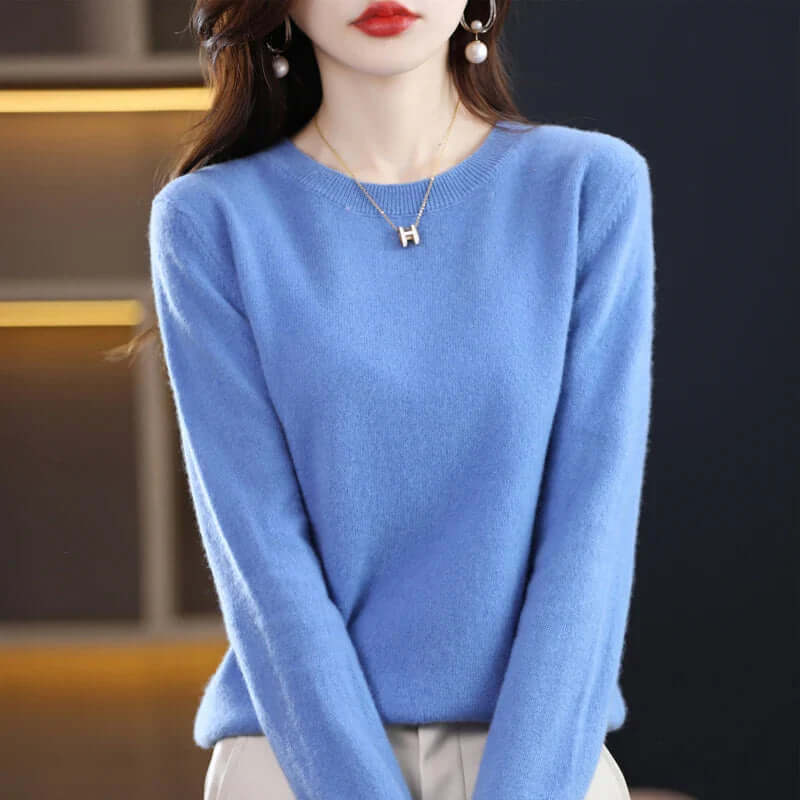 Homixa women's fine-knit crew-neck sweater with ribbed cuffs and solid color finish, showcasing a cozy, stylish knit design.