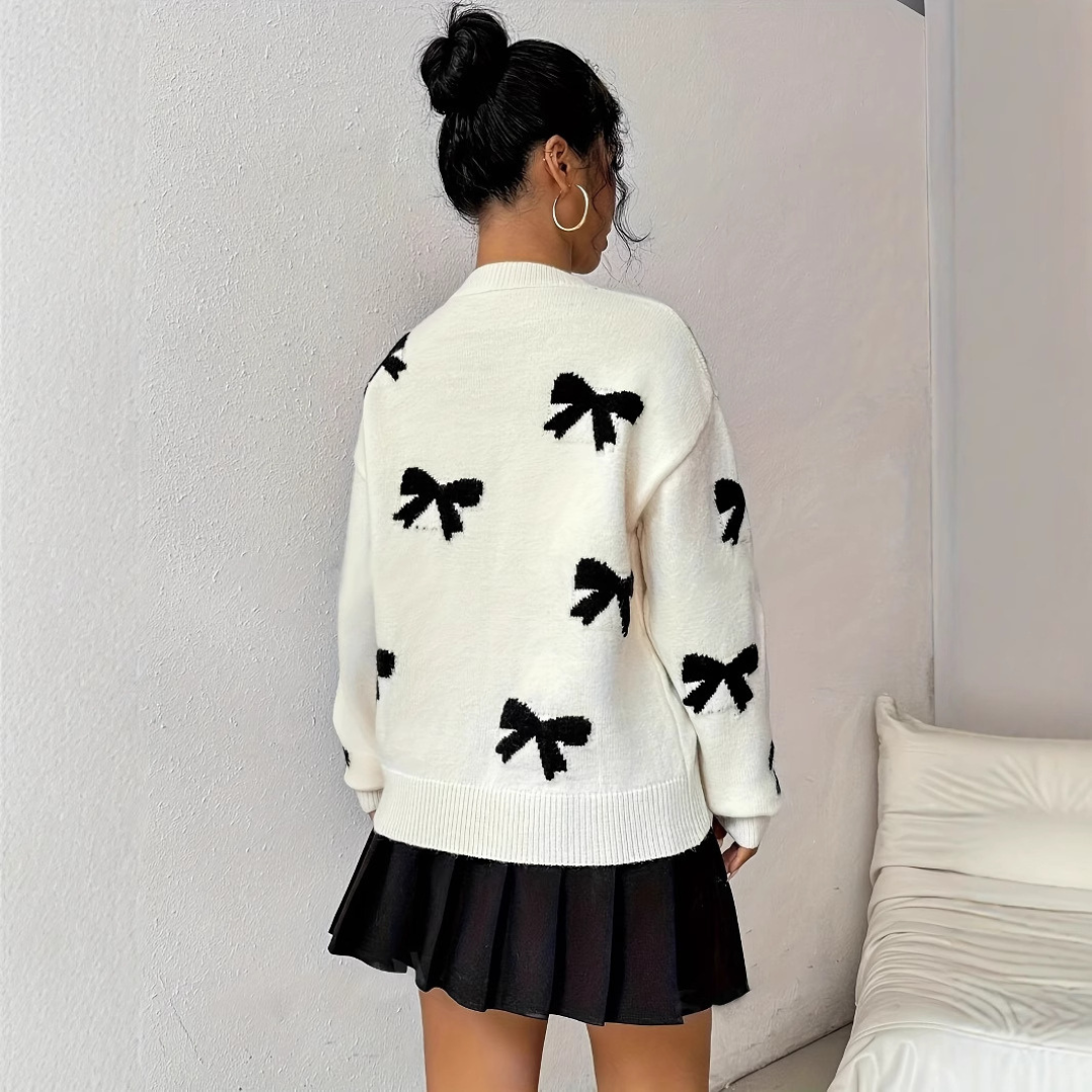 Homixa women's sweater from the Everyday Layer Jasper Edit, featuring a cozy knit design in neutral tones.