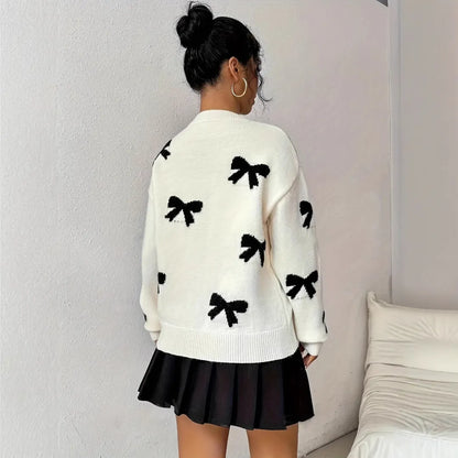 Homixa Louise women's bow-pattern crew-neck sweater with ribbed cuffs and hem, featuring a stylish and cozy knit design.