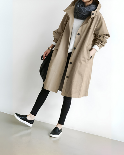 Beckmiller Classic Hooded Trench Coat in neutral fabric, featuring a hood, button closure, and tailored fit displayed on a hanger.