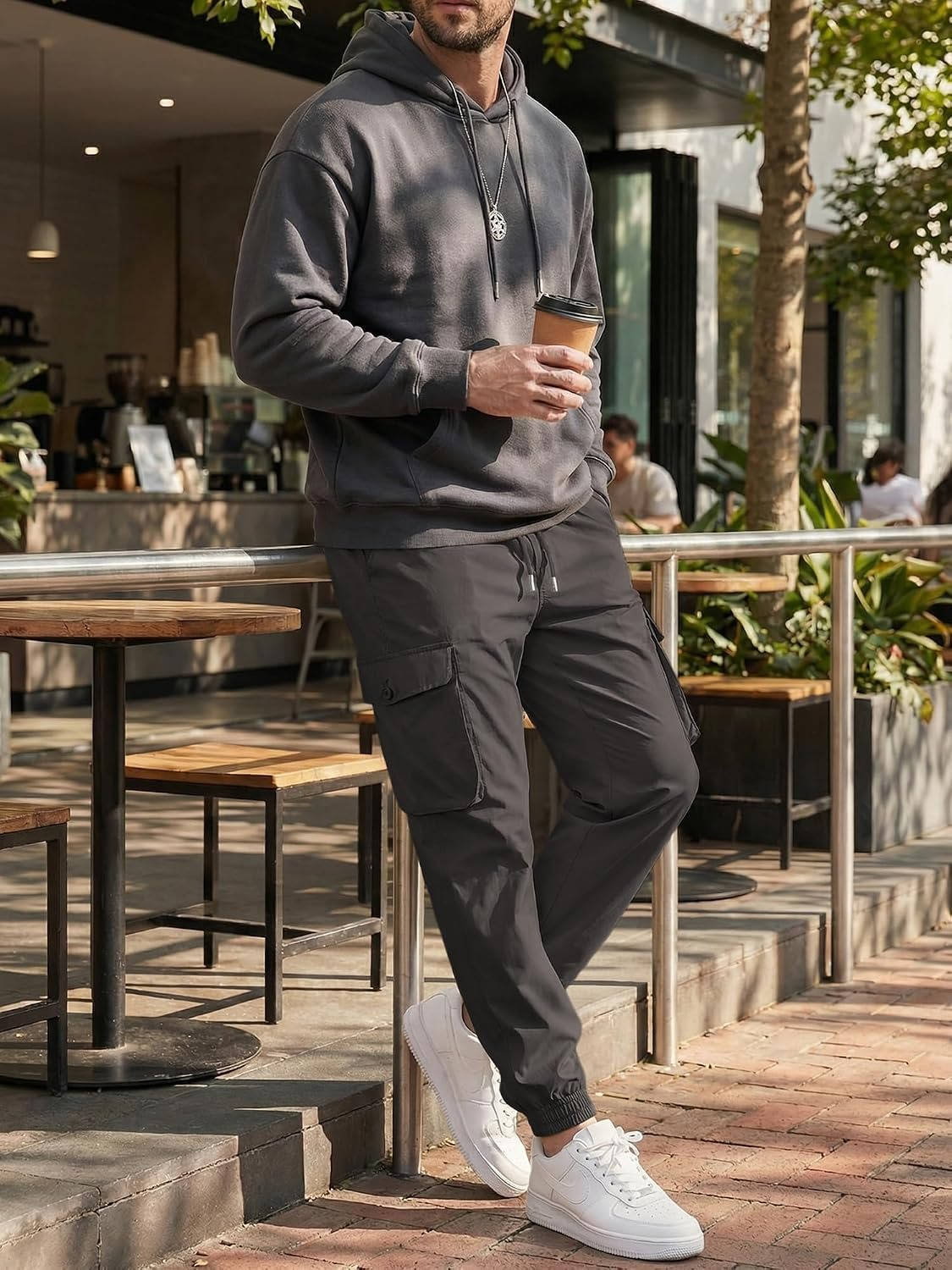 Homixa Belvora men's cargo joggers with drawstring waist, flap pockets, and tapered cuffs, made for casual comfort.