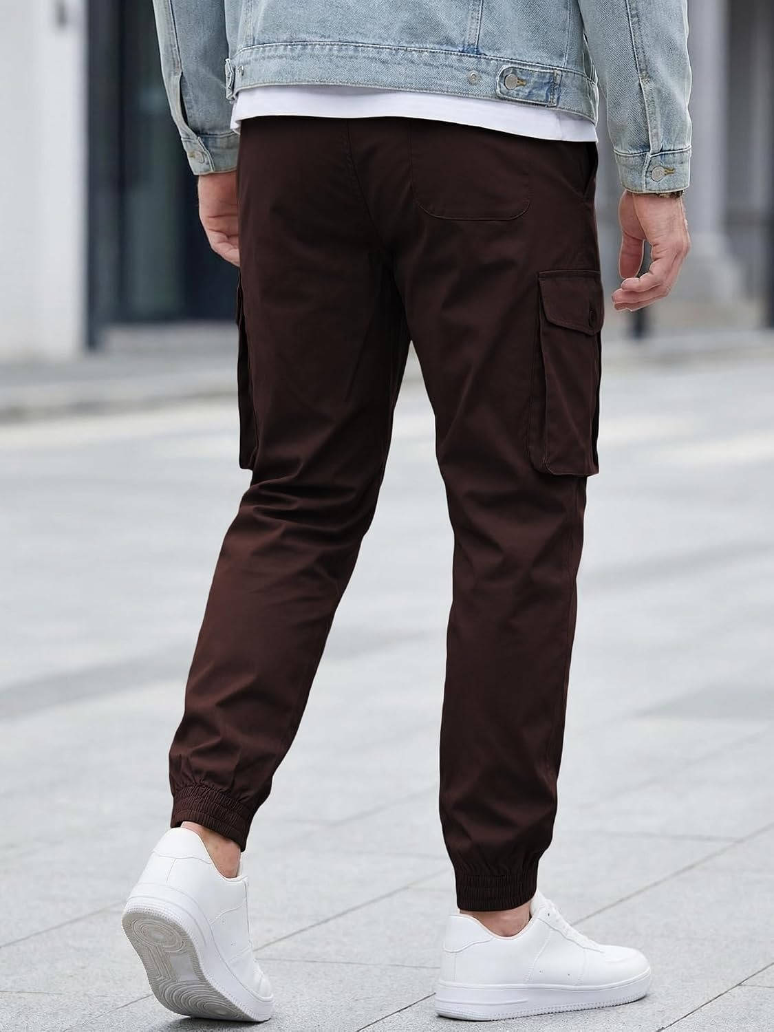 Homixa Belvora men's cargo joggers with drawstring waist, flap pockets, and tapered cuffs, made for comfortable casual wear.