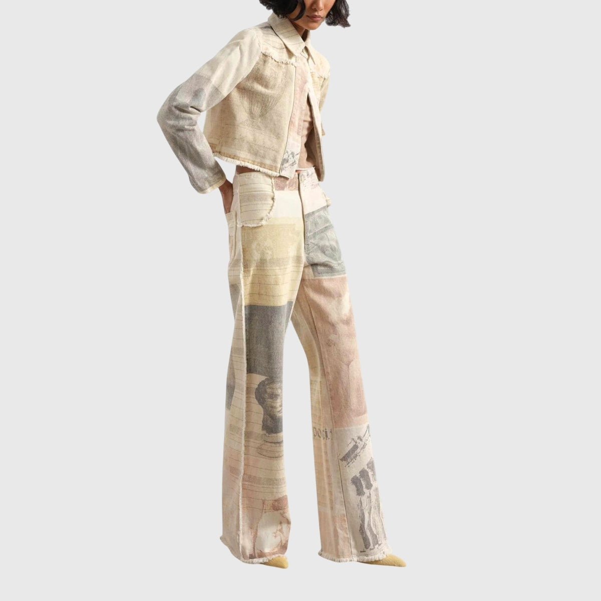 Homixa Alma women's vintage collage-print wide-leg jeans with high waist and frayed hems, showcasing a stylish retro denim look.