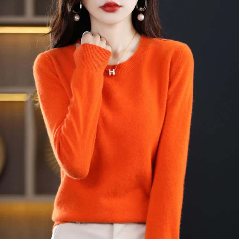Homixa Belvia women's fine-knit crew-neck sweater with ribbed cuffs and solid-color finish, showcasing a close-up of the soft knit fabric.