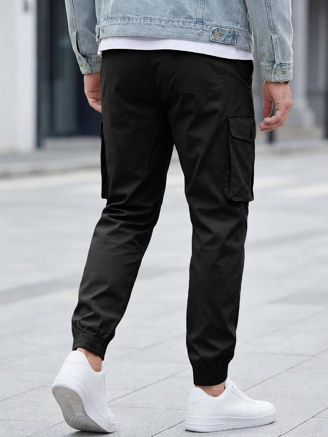 Homixa Belvora men's cargo joggers with drawstring waist, flap pockets, and tapered cuffs, shown in a casual front view.