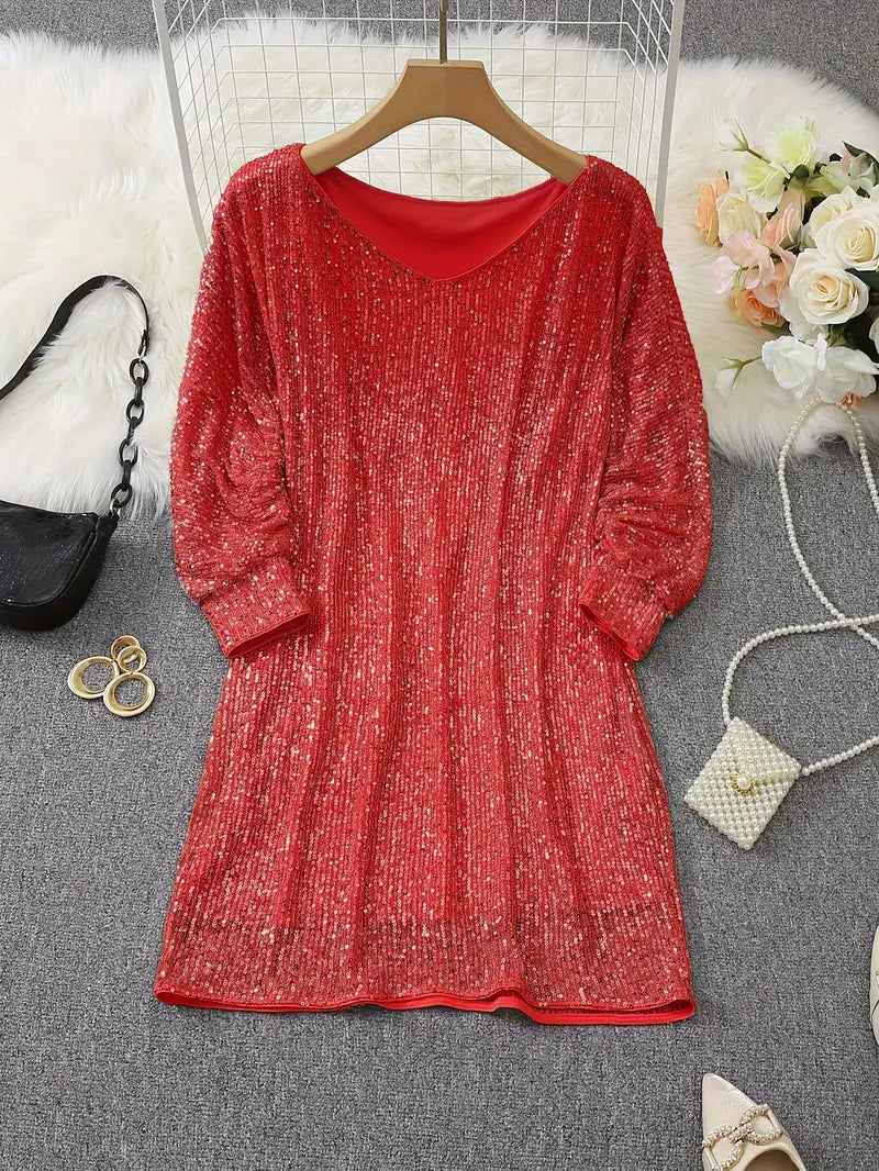 Shimmering women's sequin cocktail dress by Emily Carter with a fitted silhouette and elegant neckline, perfect for evening events.