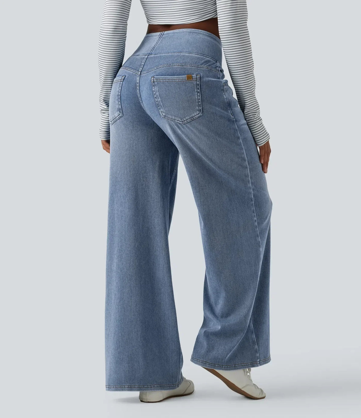 Mercer & Bloom Velouré Flex™ washed casual baggy wide-leg jeans with mid-rise, draped design and front pockets.