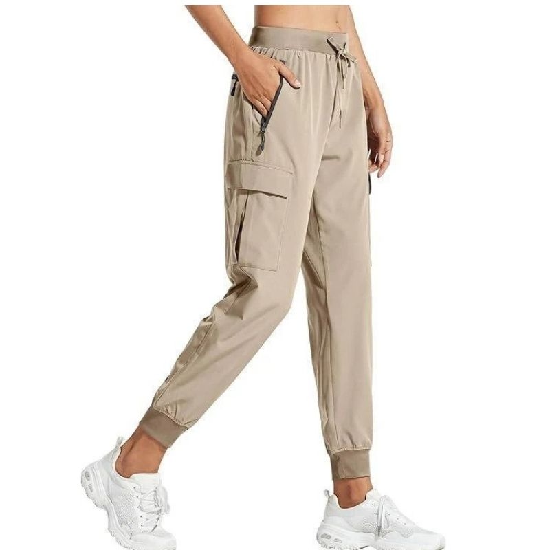 Women's Olive & Evy cargo joggers, lightweight quick-dry hiking and casual travel pants with relaxed fit and functional pockets.