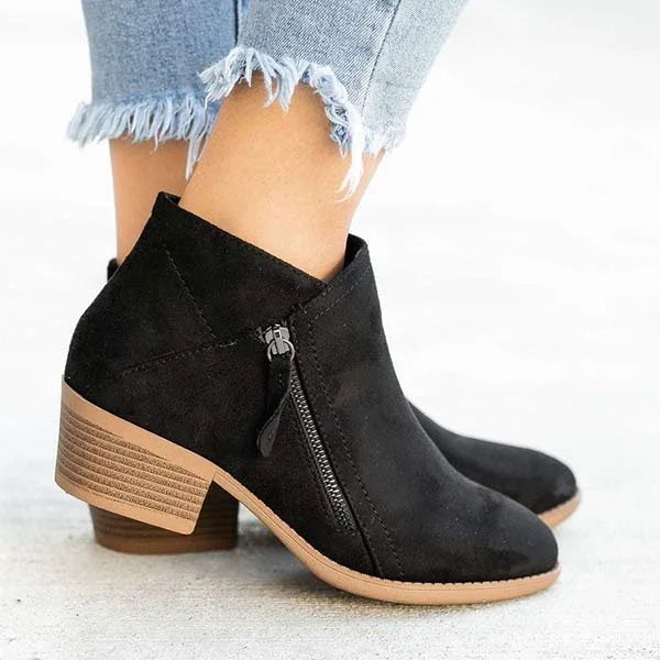 Homixa women's ankle boots from the Harper Edit, stylish everyday footwear with sleek leather and low heel design.