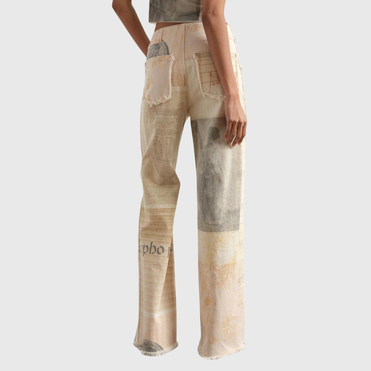 Homixa Alma women's vintage collage-print wide-leg jeans with high waist and frayed hems, styled with casual urban outfit