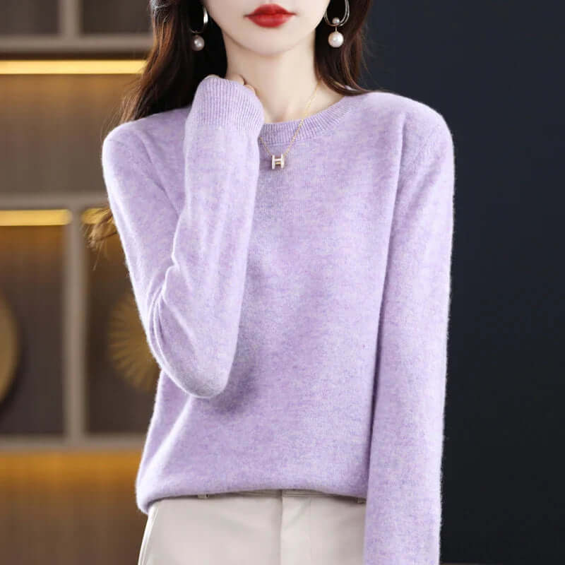 Homixa Belvia women's fine-knit crew-neck sweater with ribbed cuffs and solid color finish, showcasing a cozy, stylish knit top.