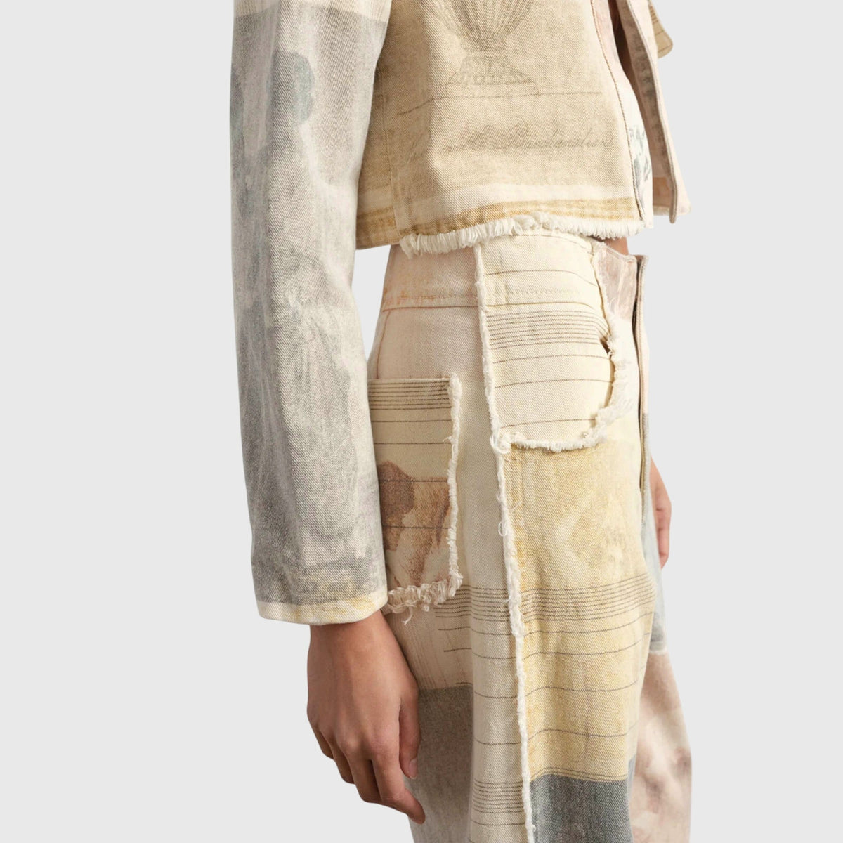 Homixa Alma women's vintage collage-print wide-leg jeans with high waist and frayed hems, styled with a relaxed fit.