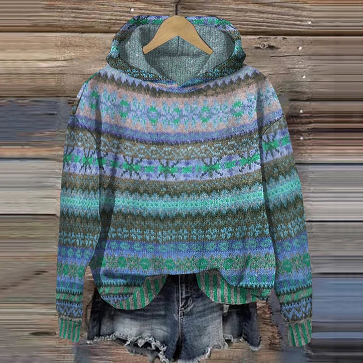 Gaby ethnic retro hoodie by Sarah & Kate Charleston featuring bold patterns and a cozy fit, displayed on a model.