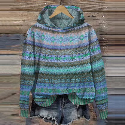 Gaby ethnic retro hoodie by Sarah & Kate Charleston featuring bold patterns and a cozy fit, displayed on a model.