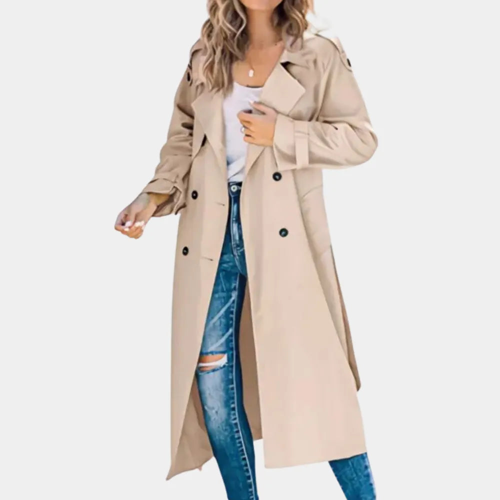Homixa Yara women's khaki tailored trench coat with button-front and classic silhouette, shown on a model in a stylish outdoor setting.