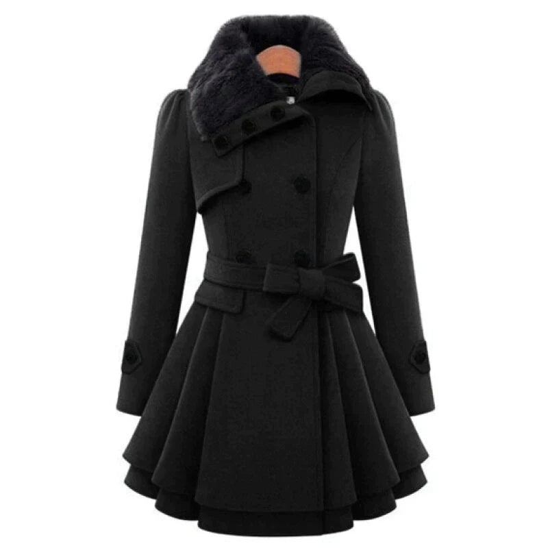 A woman wearing the Avery Lane Brighton Claudia vintage flair trench coat, featuring classic design and stylish details.
