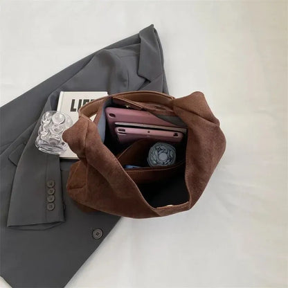 Homixa tote bag for women with pocket detail, stylish and practical accessory for everyday use.