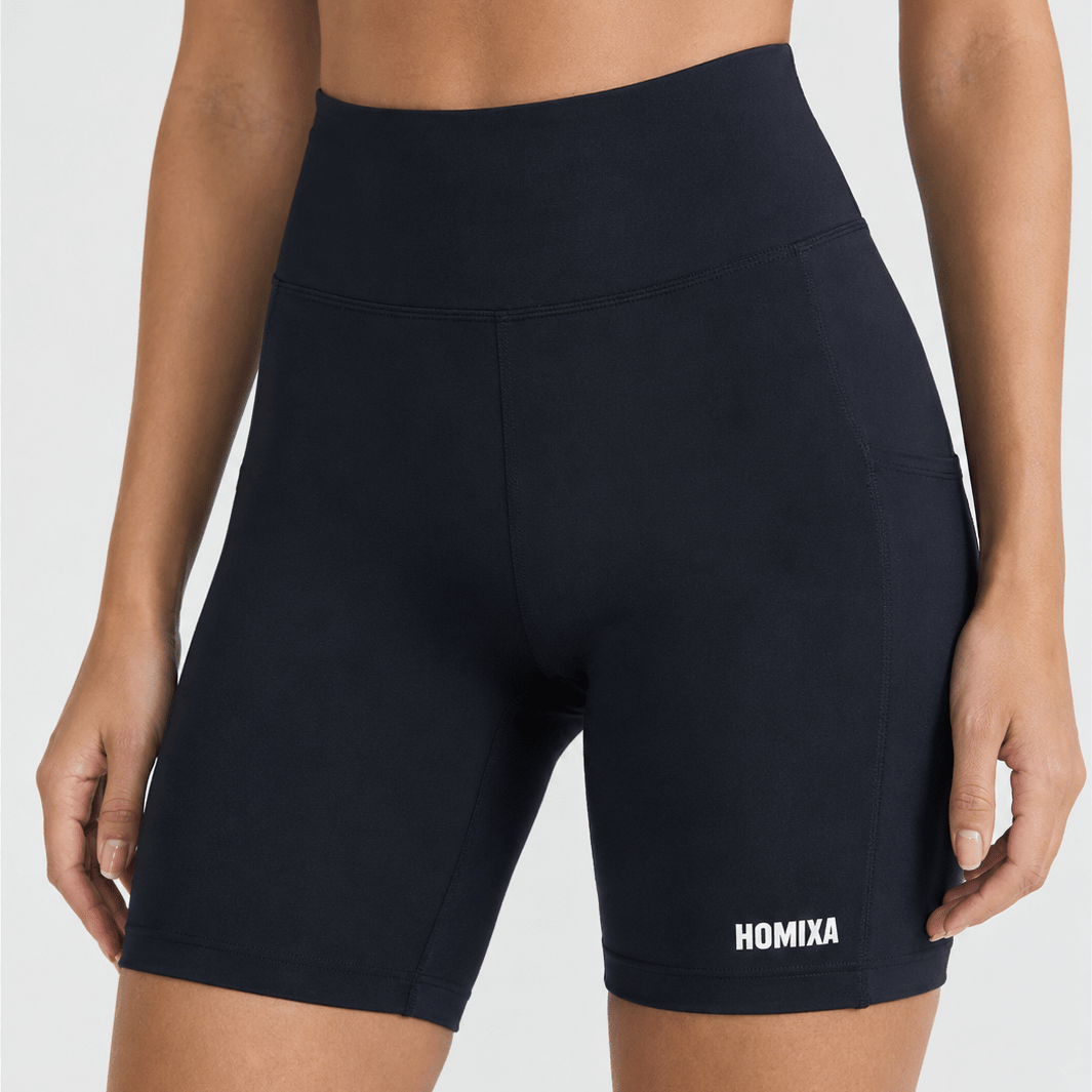Black Homixa Pocket Core Women's Bermuda Shorts displayed on a model, showcasing comfortable fit and functional pockets.