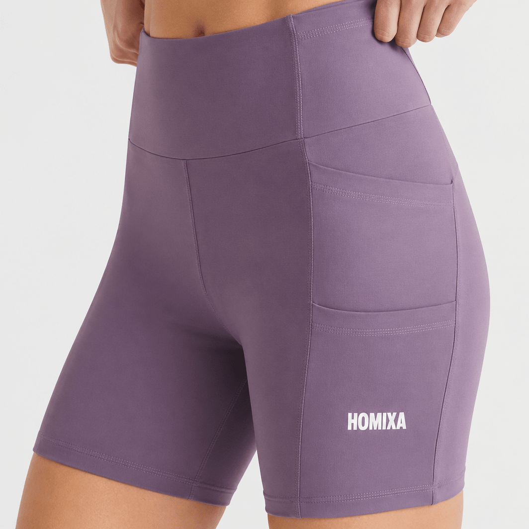 Homixa Pocket Core women's Bermuda shorts in mauve purple, featuring side pockets and a comfortable fit.