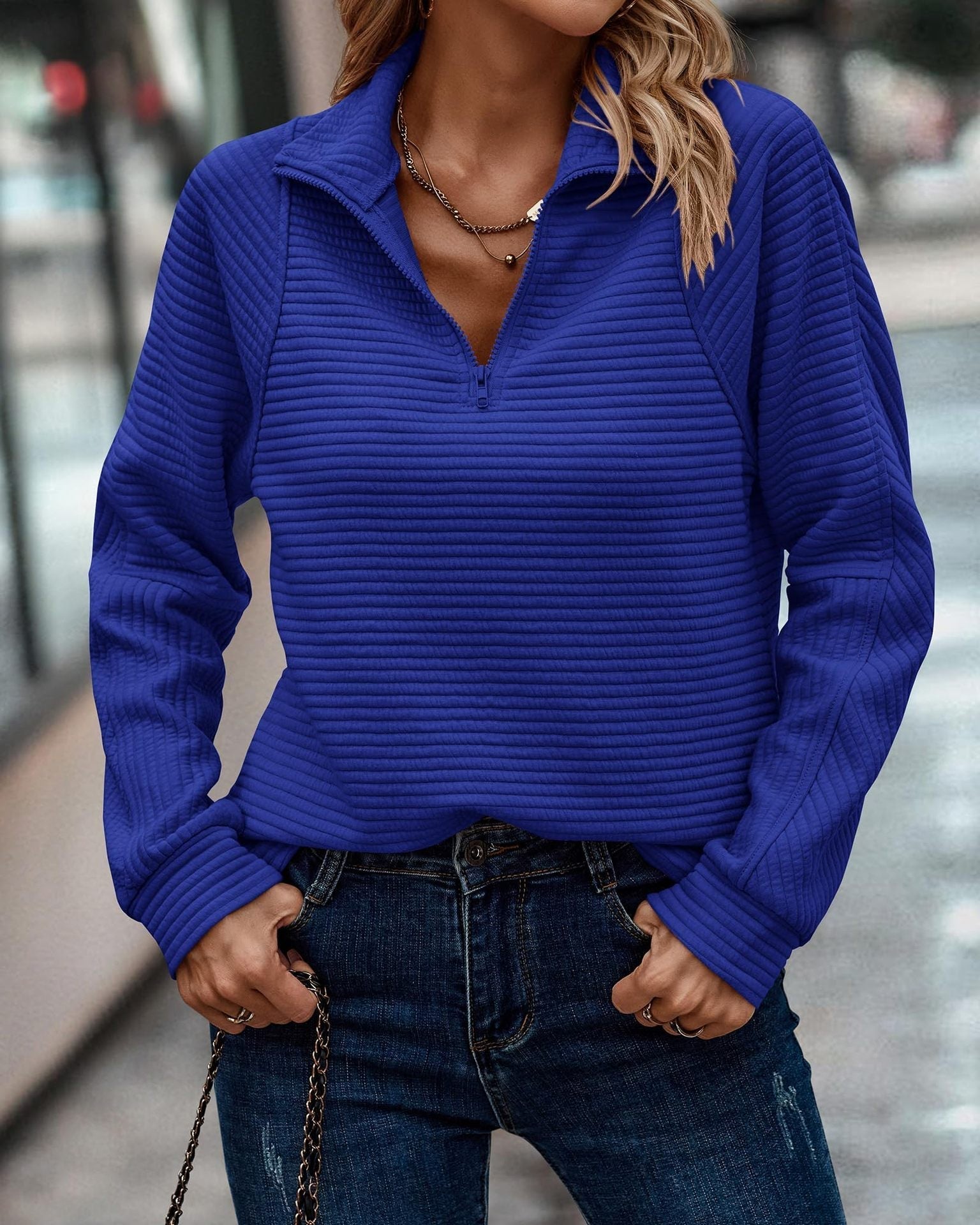 Homixa women's knit sweater with ribbed details and quarter-zip, in blue, featuring a cozy, stylish fit.