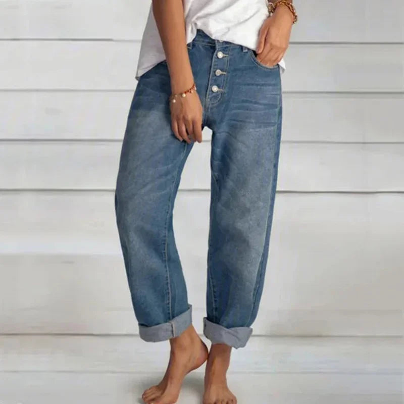 Light blue relaxed stretch jeans with high waist and straight fit, featuring a simple design and side slit, by bvnv.
