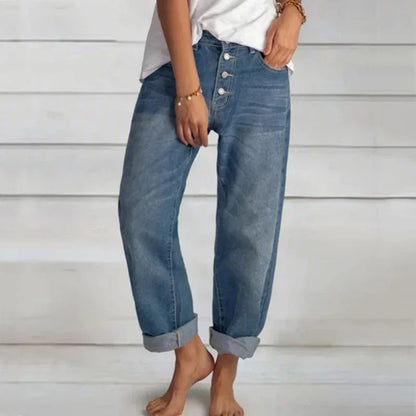 Light blue relaxed stretch jeans with high waist and straight fit, featuring a simple design and side slit, by bvnv.