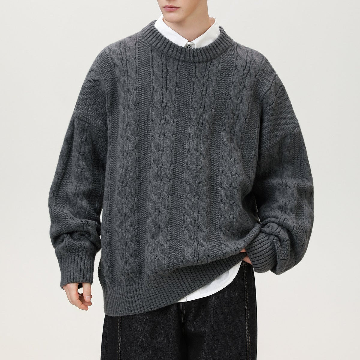 Homixa Arbury cable-knit crew-neck sweater with relaxed fit, dropped shoulders, and ribbed cuffs, shown in a cozy knit design.