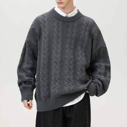 Homixa Arbury cable-knit crew-neck sweater with relaxed fit, dropped shoulders, and ribbed cuffs, shown in a cozy knit design.