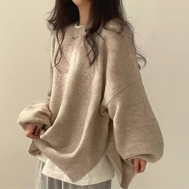 Homixa BILOG oversized knit sweater with crew neck, long sleeves, ribbed cuffs, and solid-color finish.