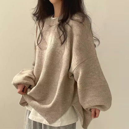 Homixa BILOG oversized knit sweater with crew neck, long sleeves, ribbed cuffs, and solid-color finish.