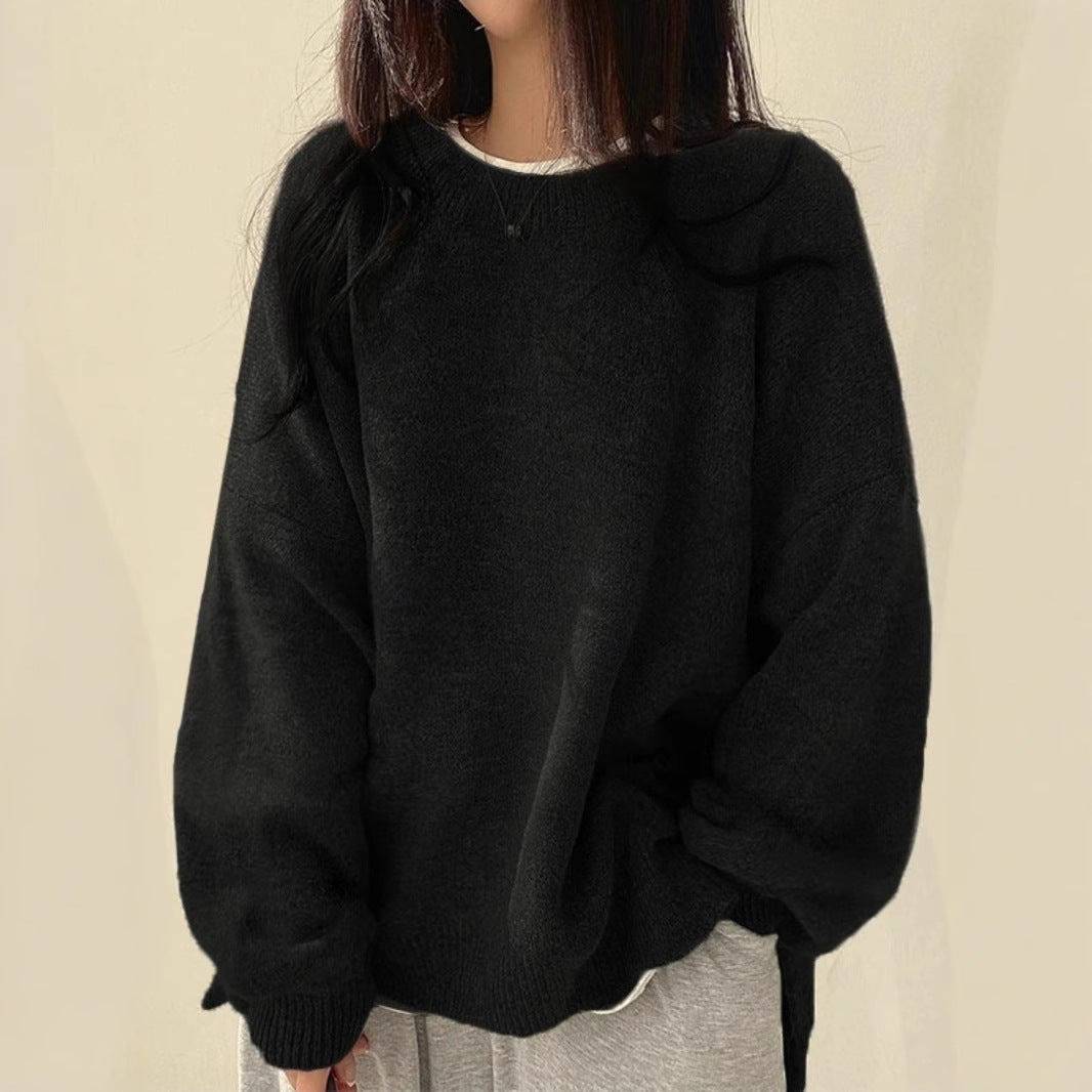 Homixa BILOG oversized knit sweater with crew neck, long sleeves, ribbed cuffs, and solid-color finish.