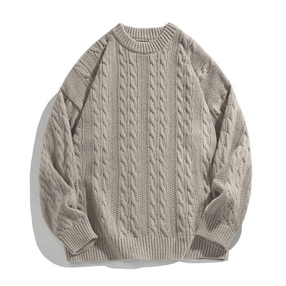 Homixa Arbury cable-knit crew-neck sweater with relaxed fit, dropped shoulders, and ribbed cuffs, displayed on a mannequin.