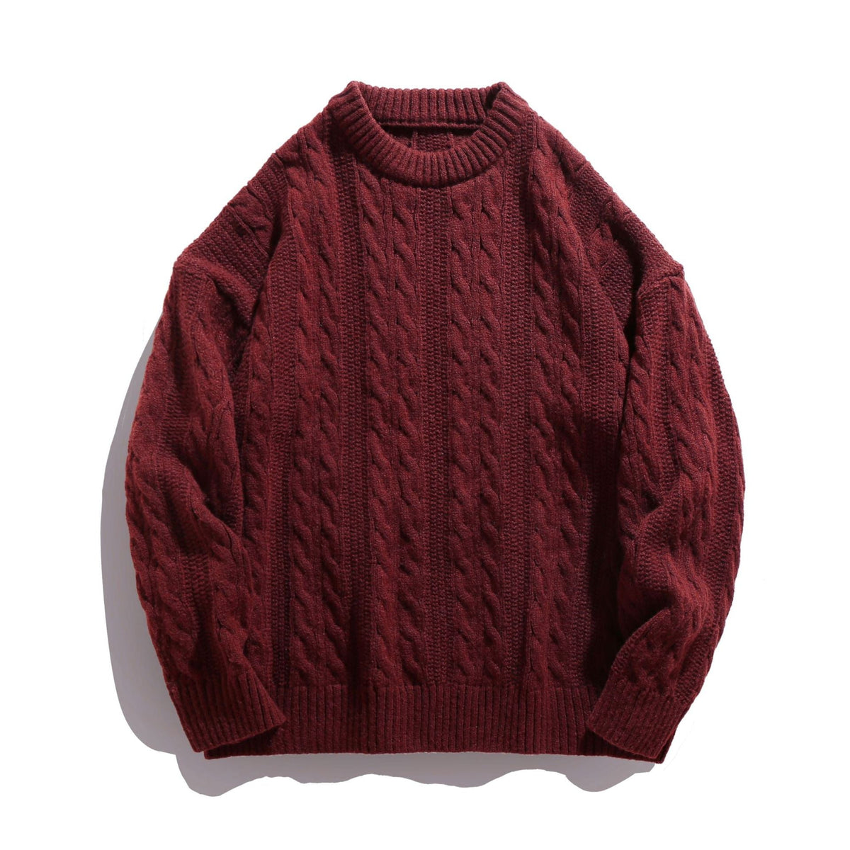 Homixa Arbury cable-knit crew-neck sweater with relaxed fit, dropped shoulders, and ribbed cuffs, shown in a cozy, textured knit style.