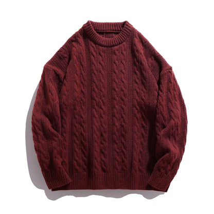 Homixa Arbury cable-knit crew-neck sweater with relaxed fit, dropped shoulders, and ribbed cuffs, shown in a cozy, textured knit style.