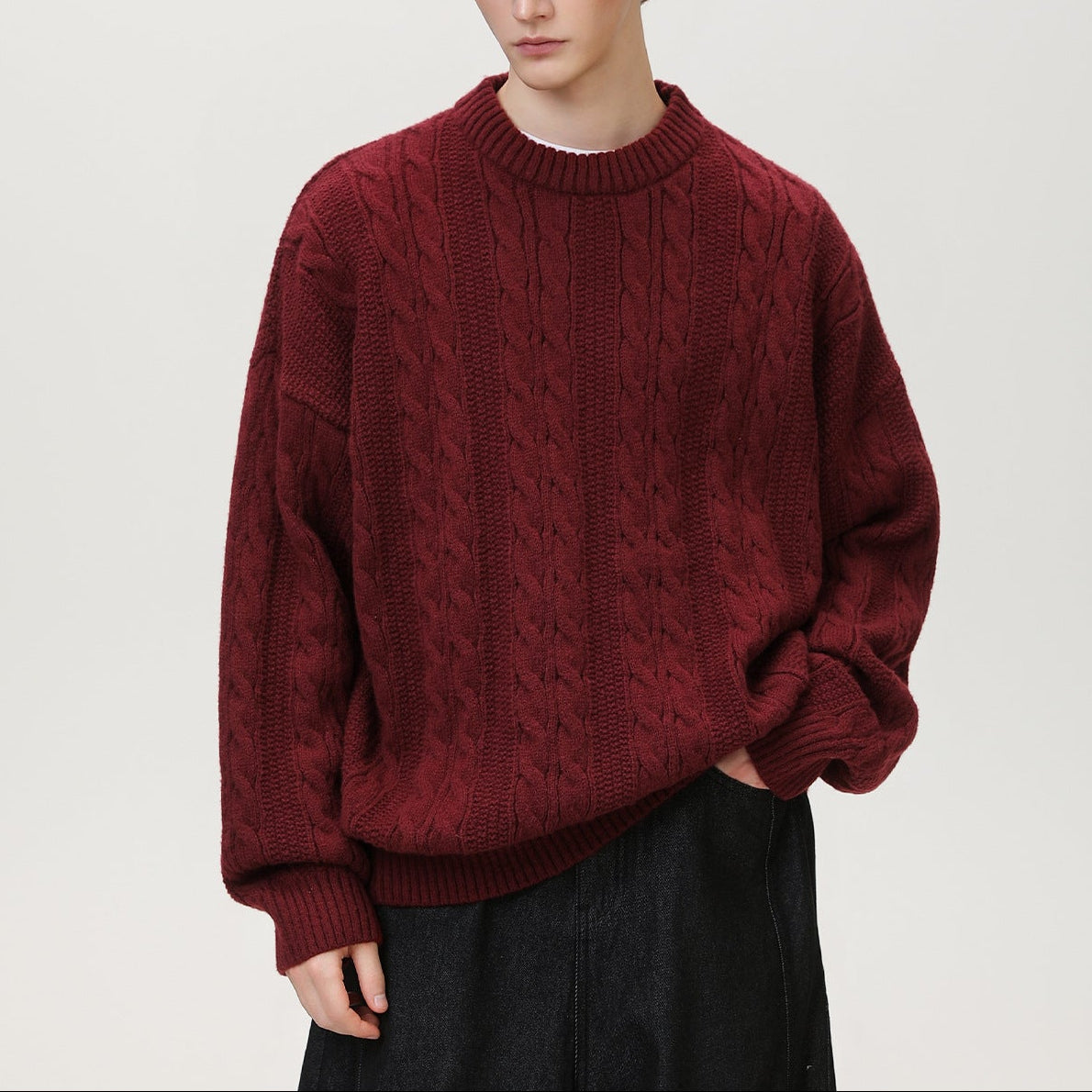 Homixa Arbury cable-knit crew-neck sweater with relaxed fit, dropped shoulders, and ribbed cuffs, displayed on a neutral background.
