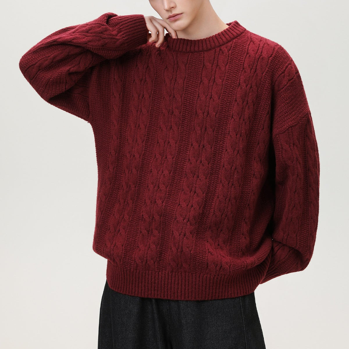Homixa Arbury cable-knit crew-neck sweater with relaxed fit, dropped shoulders, and ribbed cuffs, displayed on a neutral background.