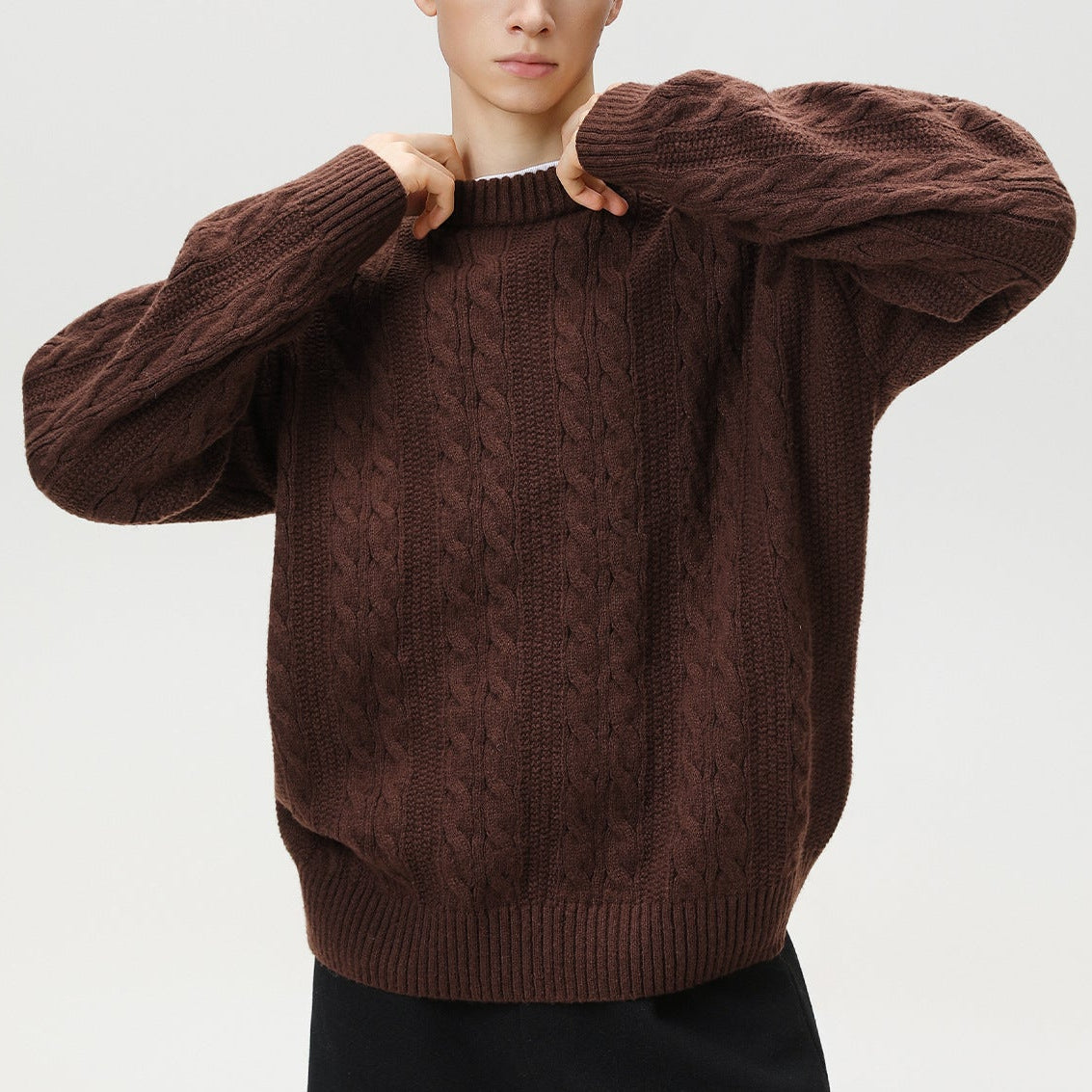 Homixa Arbury cable-knit crew-neck sweater with relaxed fit, dropped shoulders, and ribbed cuffs, displayed on a neutral background.