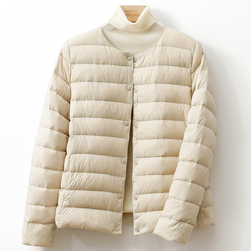 Jack Hafford Helga Down Puff Jacket in black, showing the quilted design, high collar, and front zipper for cold weather warmth.
