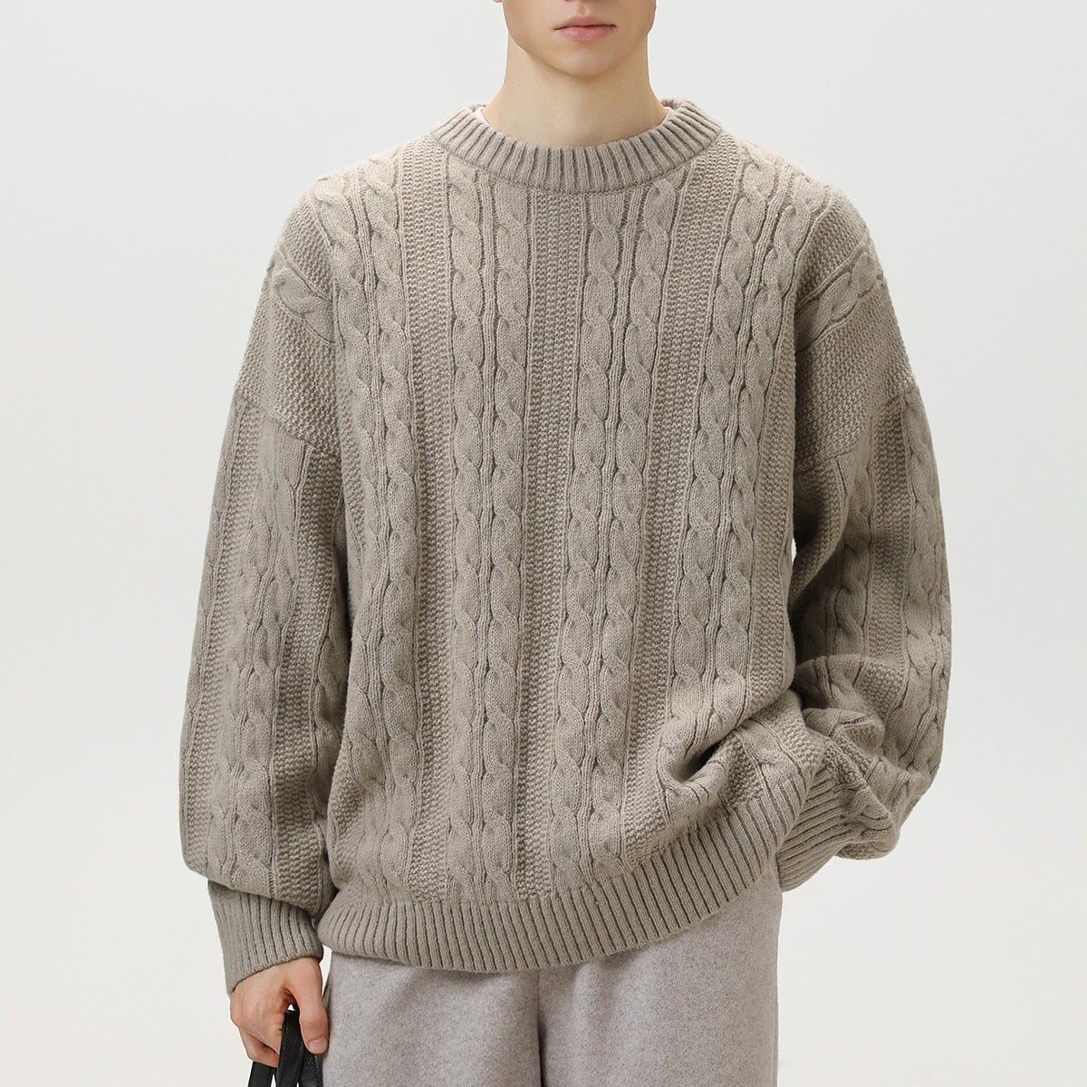 Homixa Arbury cable-knit crew-neck sweater with relaxed fit, dropped shoulders, and ribbed cuffs, stylish and cozy for everyday wear.