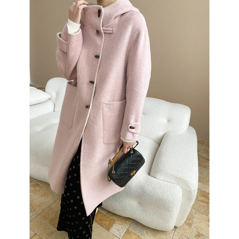 Homixa Bellenza women's mid-length hooded toggle coat with relaxed fit, patch pockets, and toggle front, stylish overcoat for women.
