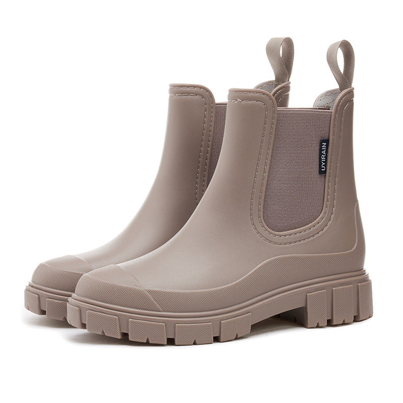 Homixa women's ankle boots with a sleek design, featuring a rounded toe and low heel, perfect for everyday footwear.