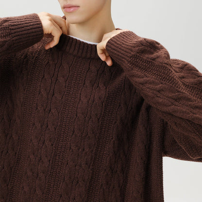 Homixa Arbury cable-knit crew-neck sweater with relaxed fit, dropped shoulders, and ribbed cuffs, shown in a cozy knit design.