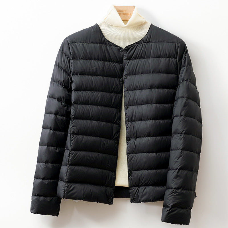 Jack Hafford Helga Down Puff Jacket in black, featuring a quilted design and hood for warmth and style.